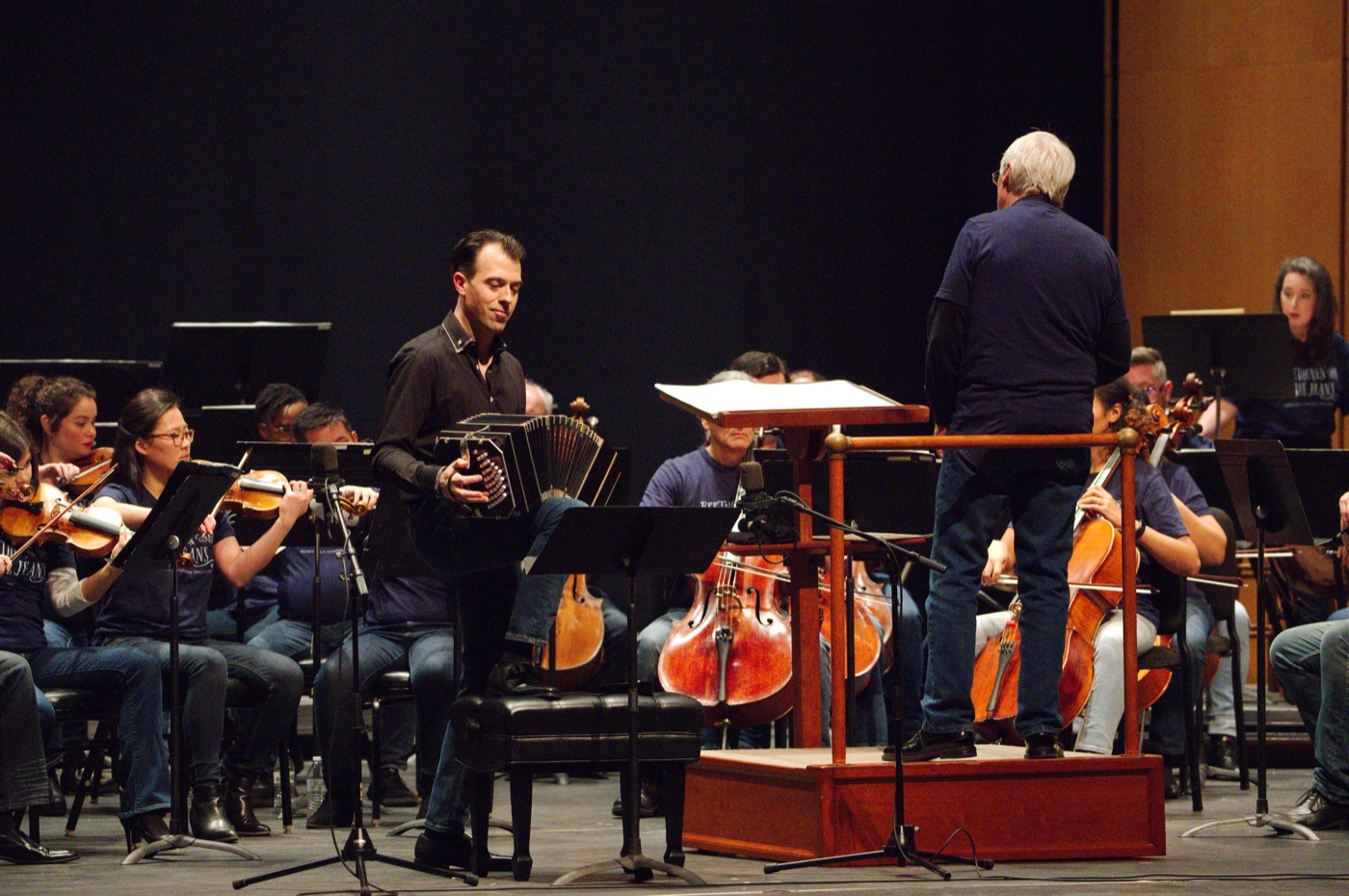 Julien Labro playing bandoneon with an orchestra and conductor