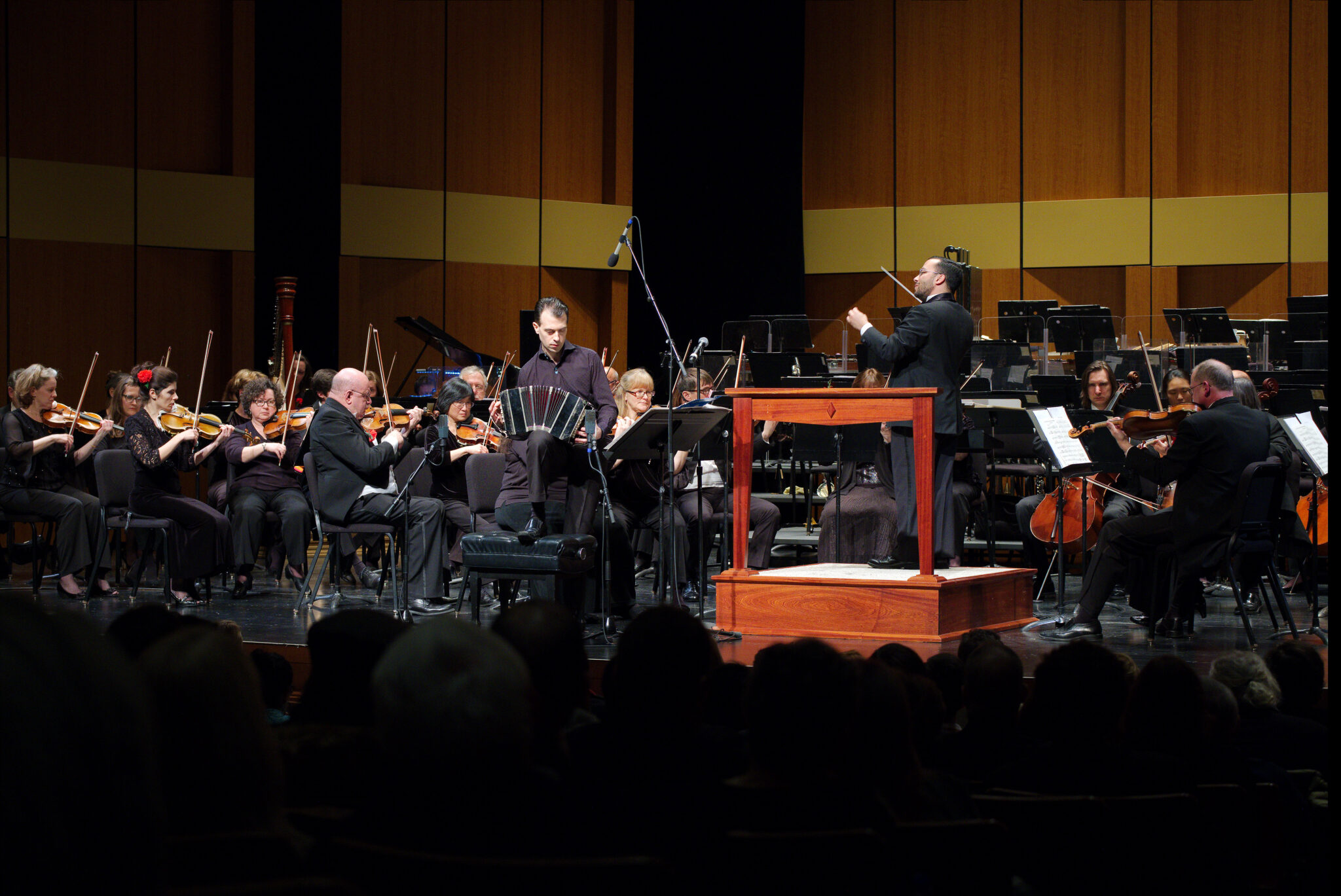 Julien Labro performing on bandoneon with orchestra