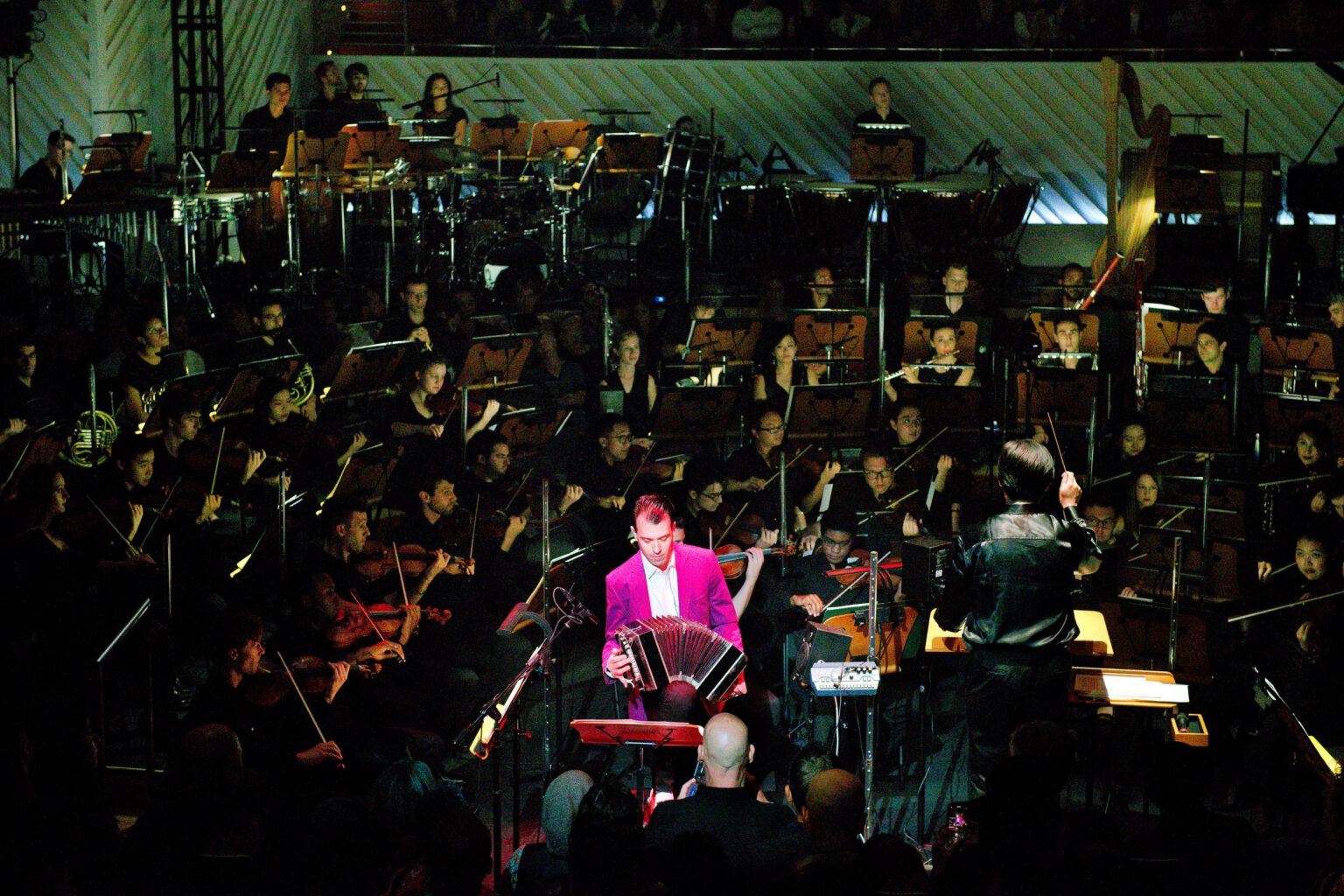Julien Labro performing bandoneon with a large orchestra